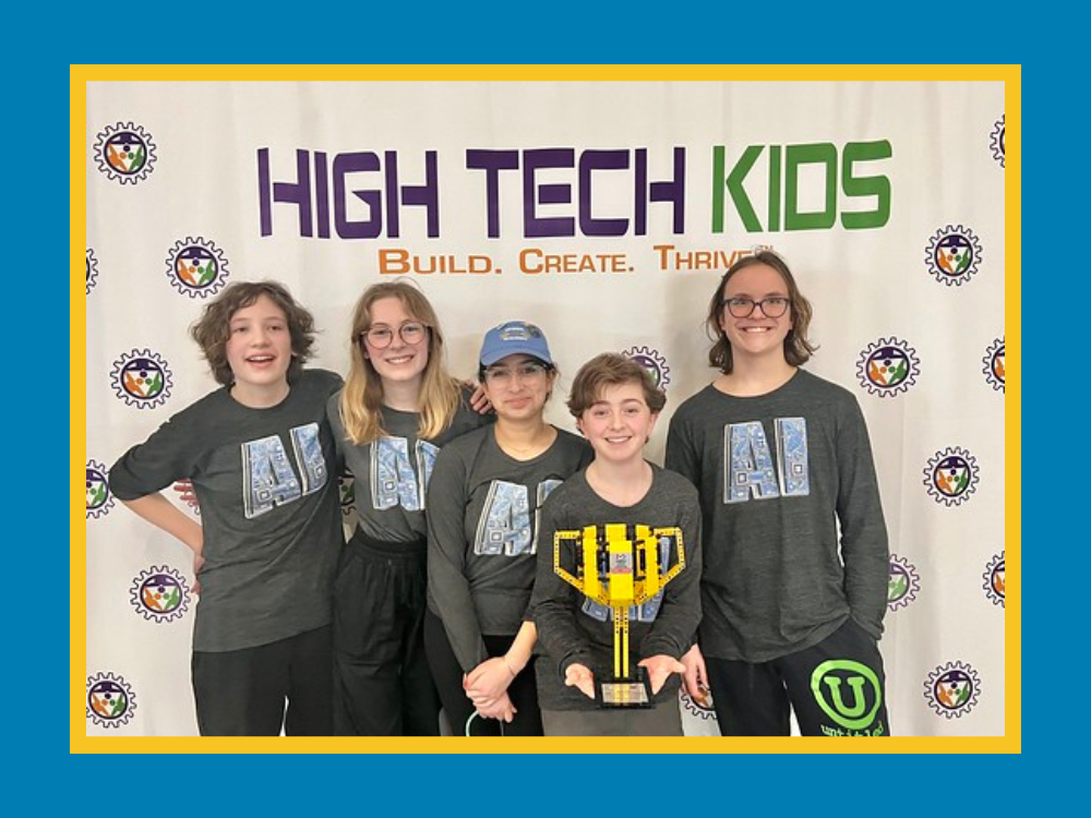Members of the team Artificial Intelligence smile with their first place trophy at the Minnesota State Championship.