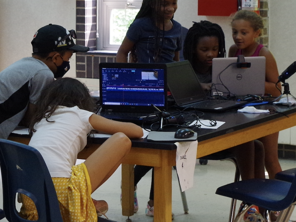 Kids working on laptops